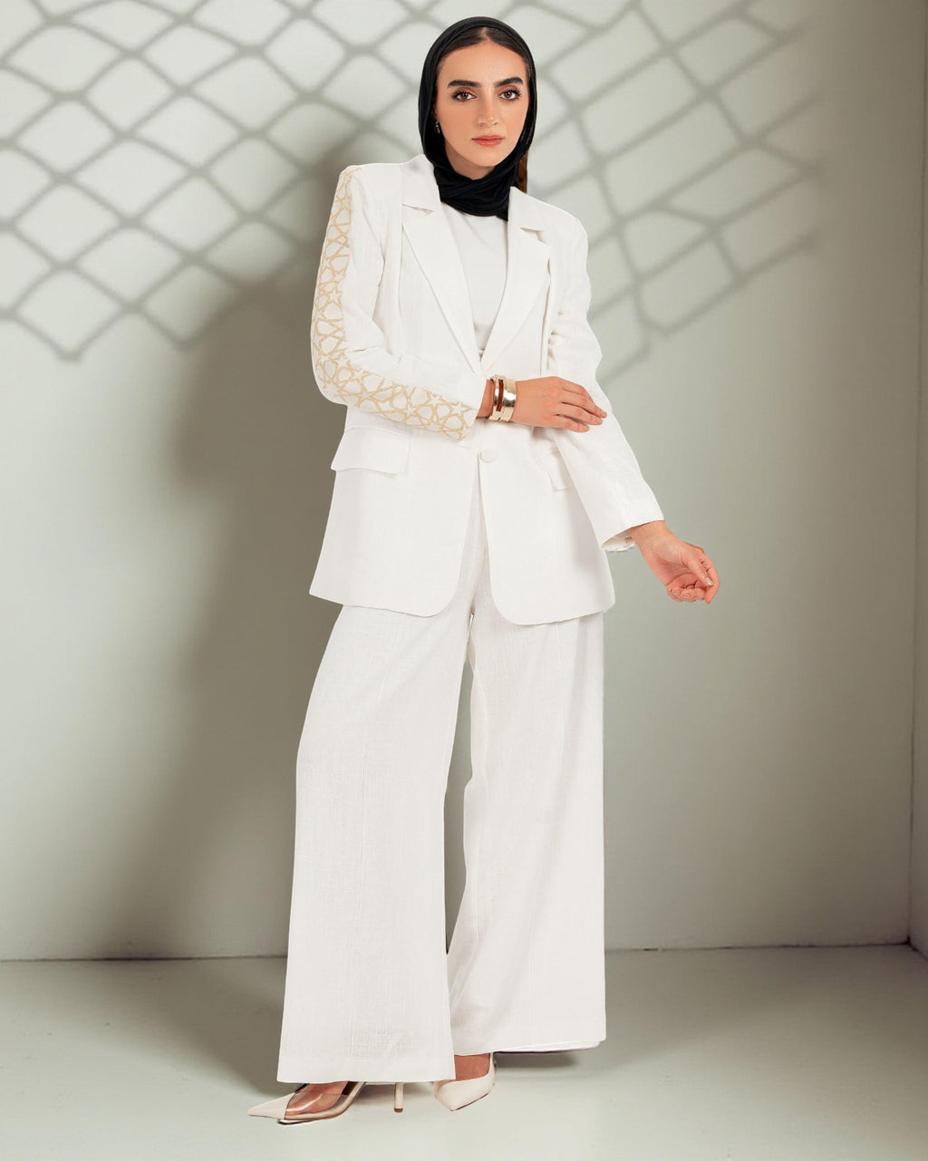 The Arabesk Co-ord, linen blazer and wide-leg pants set with geometric embroidery, side view — Gigi's