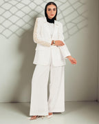 The Arabesk Co-ord, linen blazer and wide-leg pants set with geometric embroidery, side view — Gigi's