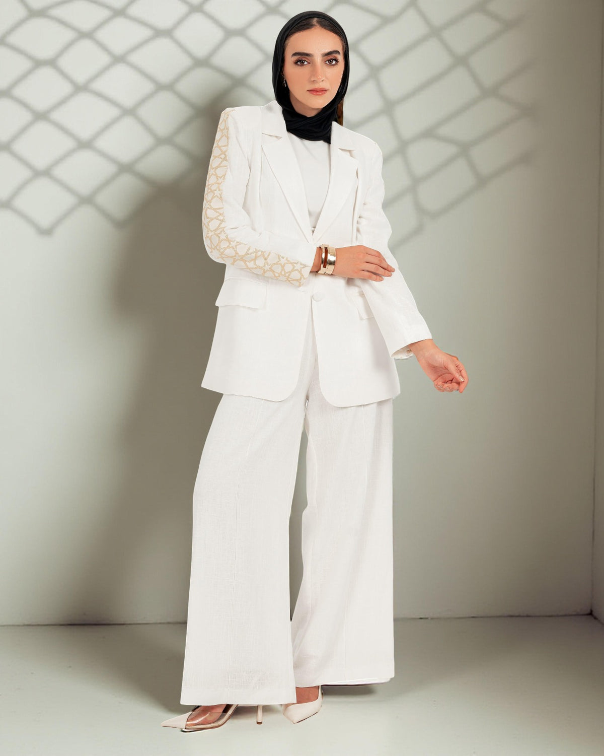 The Arabesk Co-ord, linen blazer and wide-leg pants set with geometric embroidery, side view — Gigi's